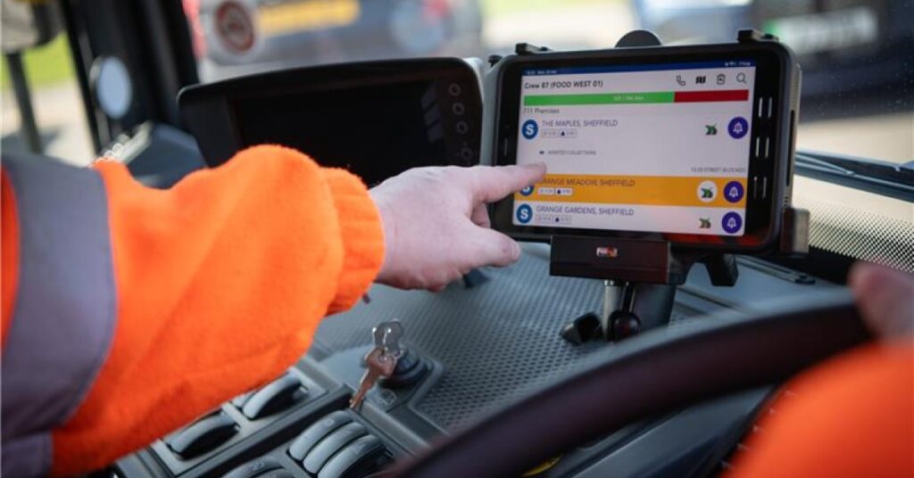Photo of a the inside of a waste lorry, showing the APP dashboard.